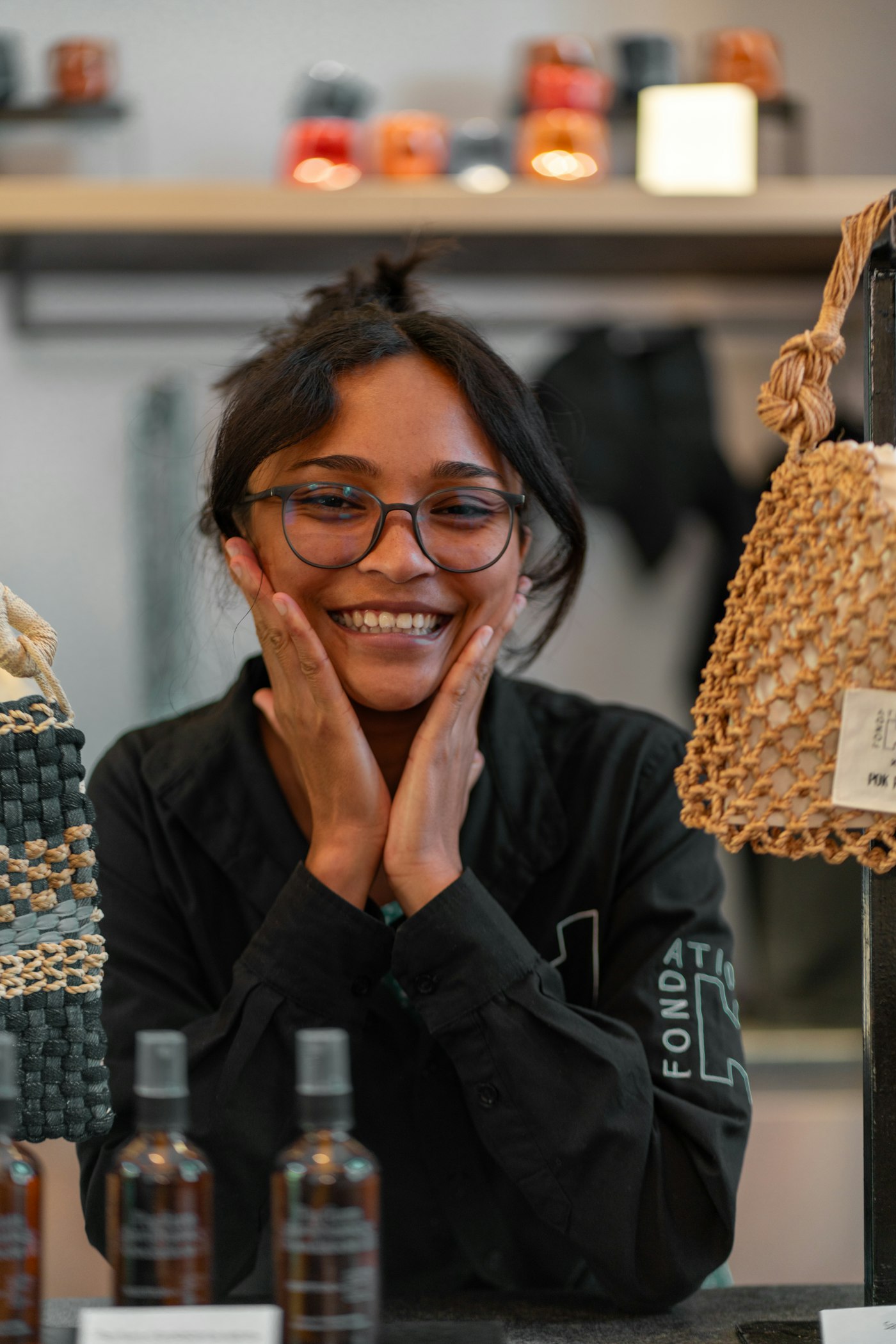 A delighted woman with her hands on her cheeks